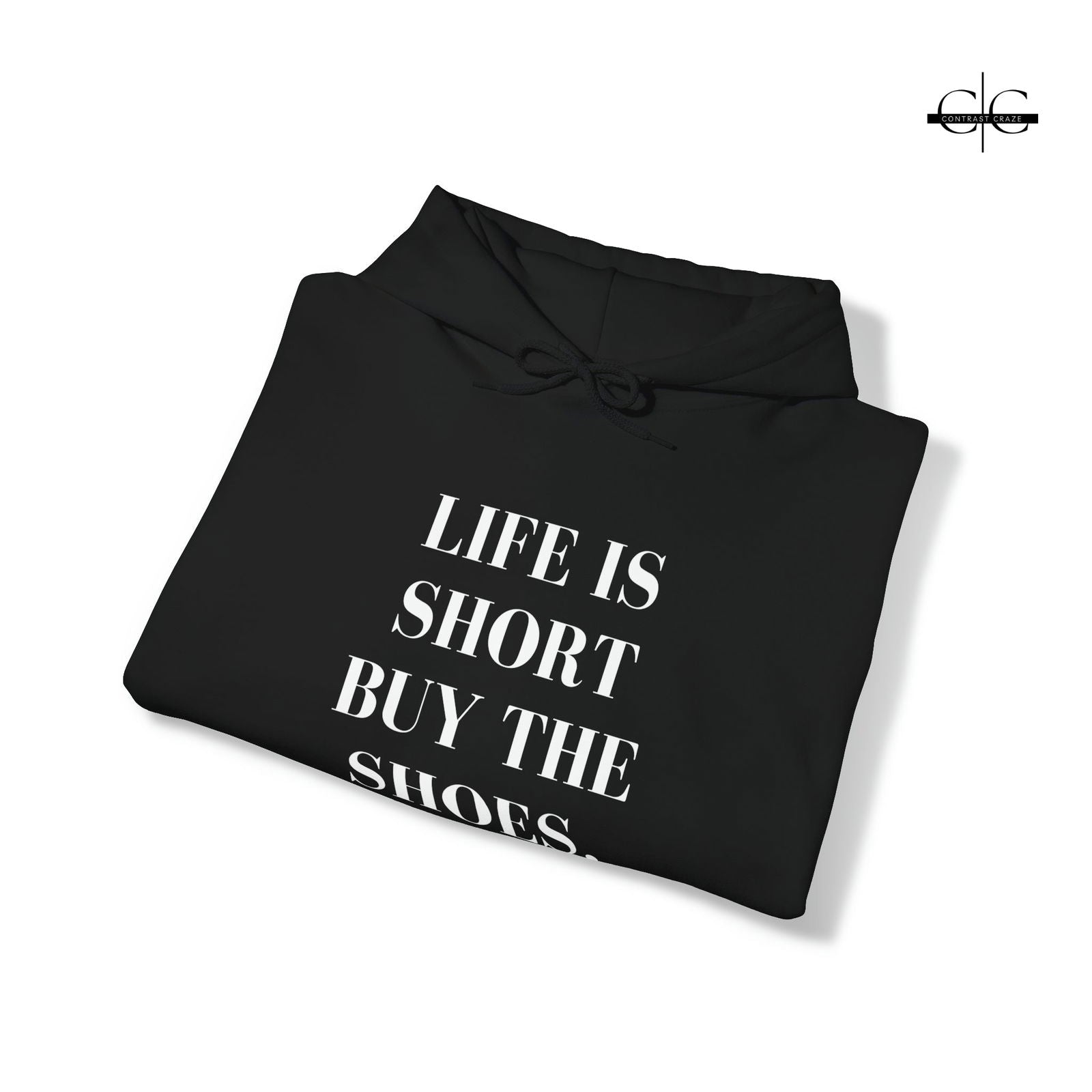 Buy Life is Short, Buy the Shoes Unisex Hoodie from Contrast Craze, a stylish .